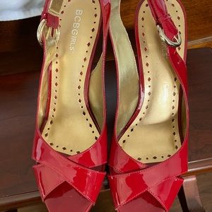 Patent leather red pumps